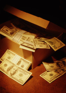 Shoebox filled with hundred dollar bills